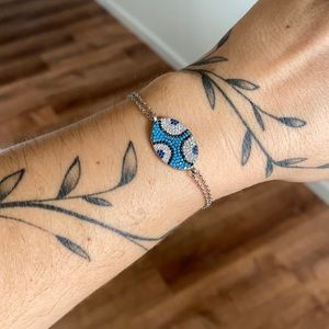 Silver (925) double chain bracelet with evil eye stone pave pendant